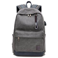 Canvas backpack with USB charging port in grey colour showing compartments
