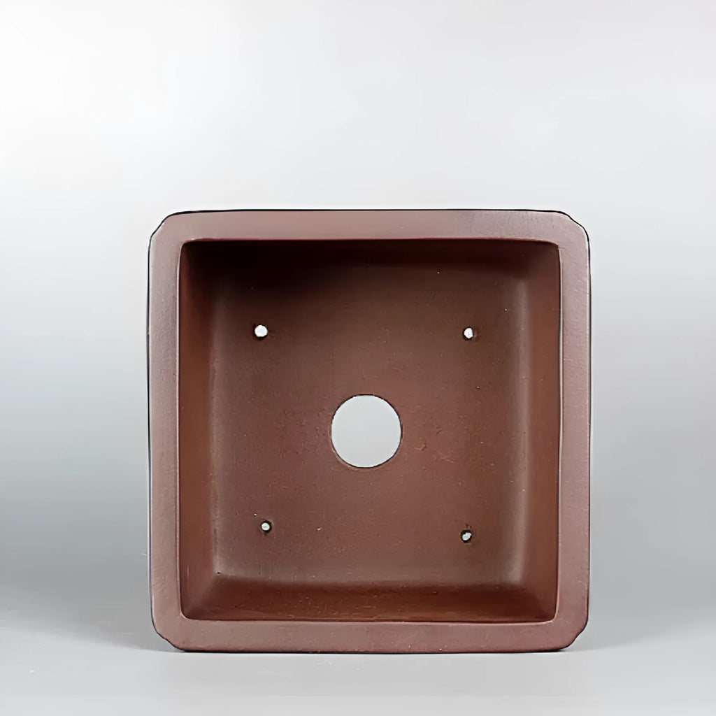 Brown handmade purple clay antique flower pot with classical design measuring 19x19x11.5 cm