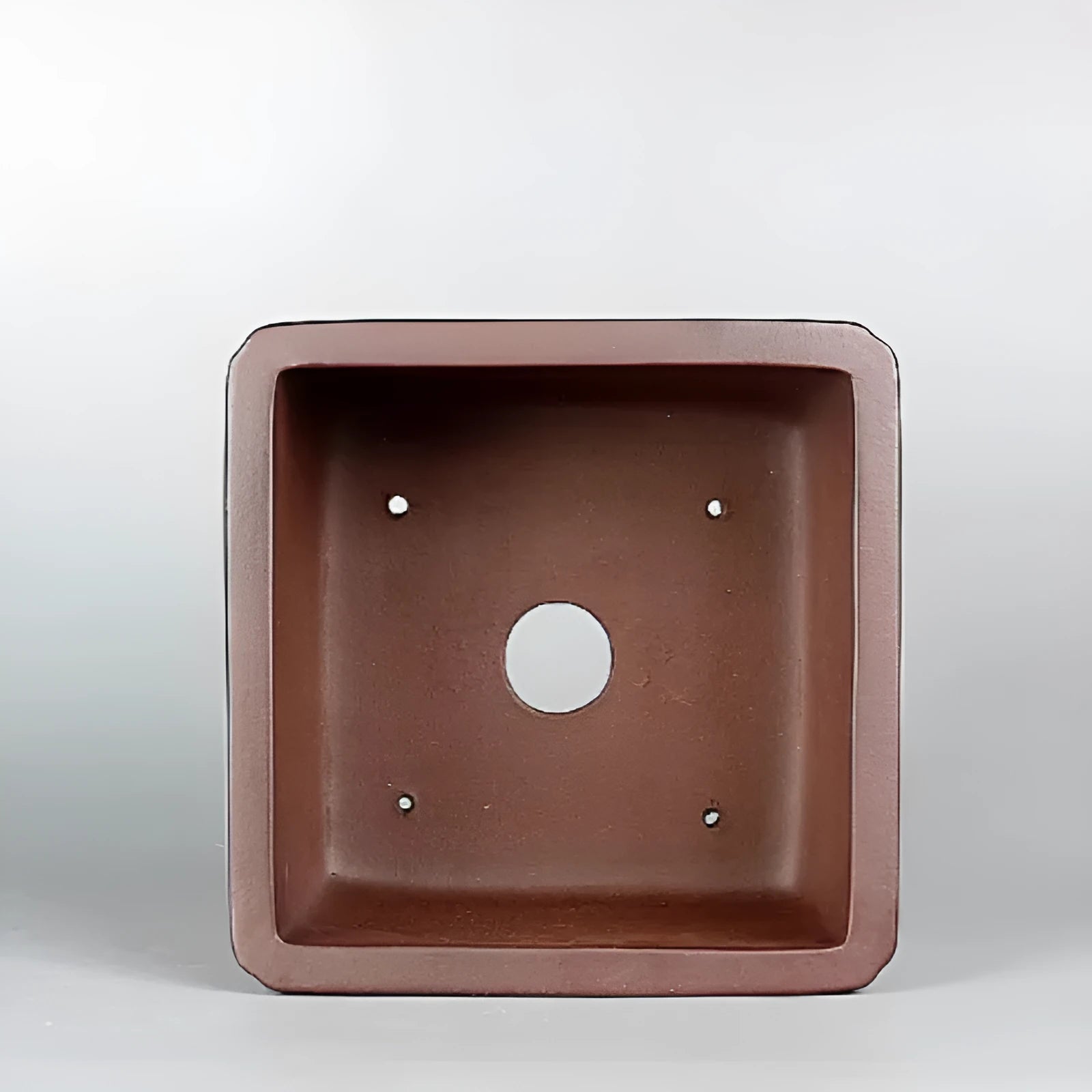 Brown handmade purple clay antique flower pot with classical design measuring 19x19x11.5 cm