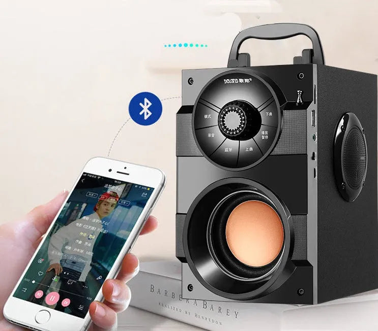 Black portable mini home audio speaker system with subwoofer and 3.5mm audio cable