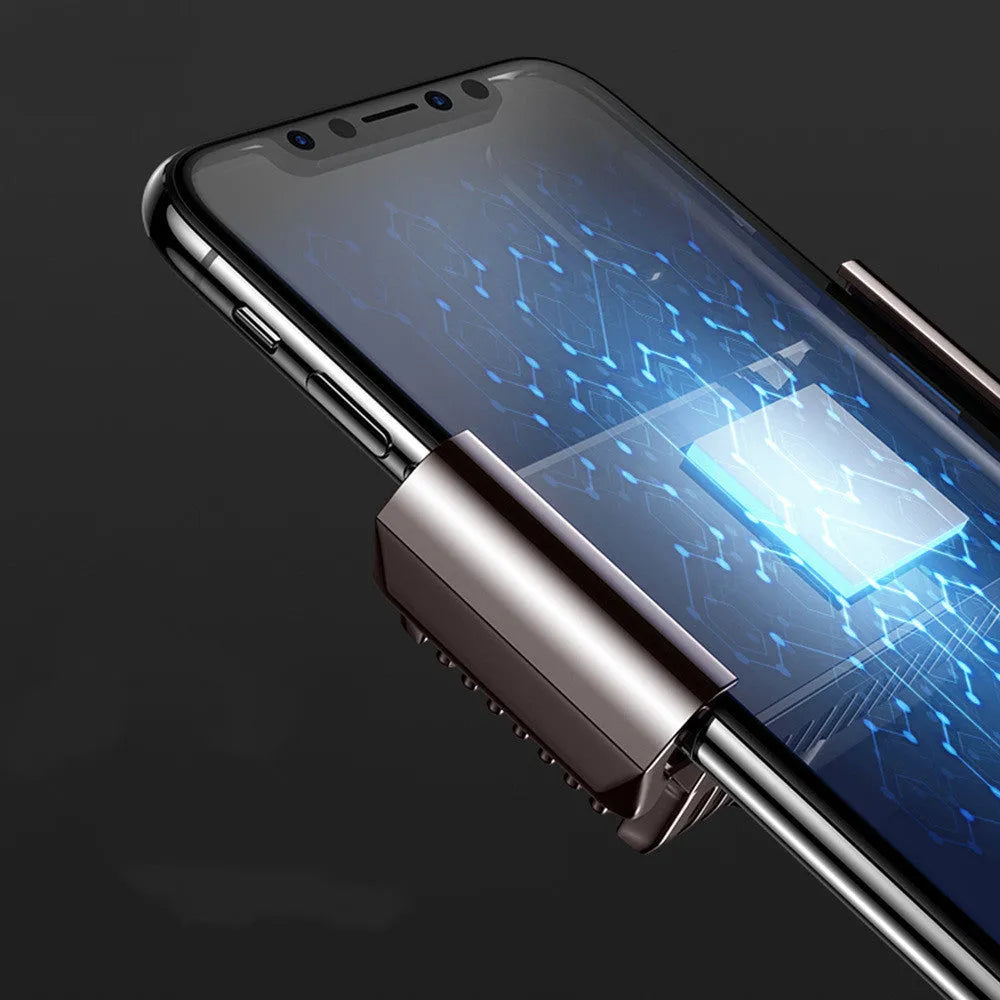 Black mobile phone radiator with clip, aluminium alloy body, attached to a smartphone for cooling.