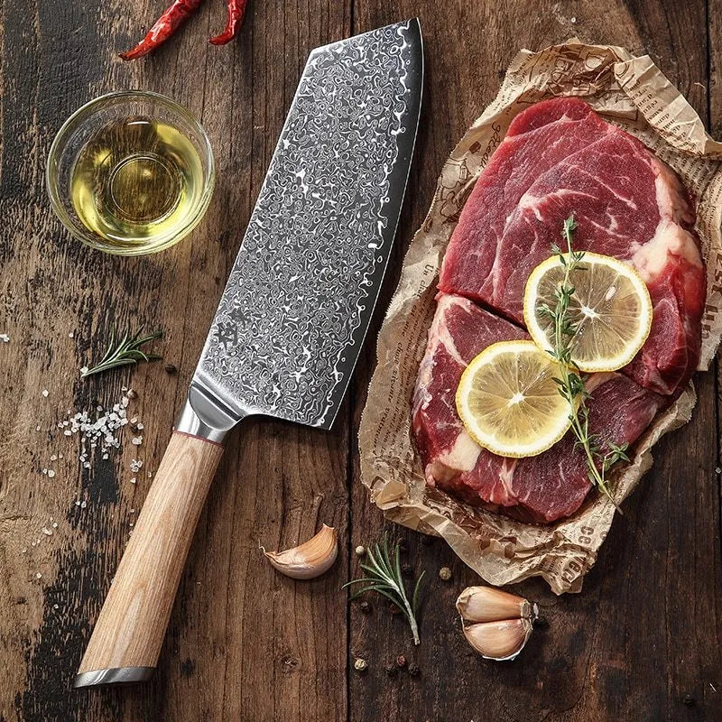 Damascus kitchen knife set with 67-layer steel blades and V gold core, 8-piece on a cutting board