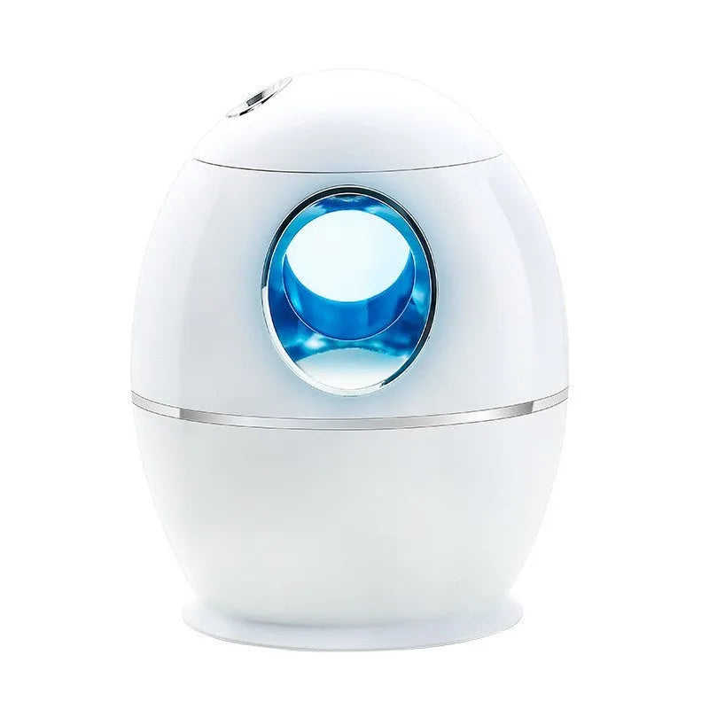 White columnar household mute air disinfection humidifier with single fog outlet on a wooden table