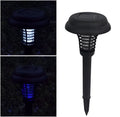 Black solar mosquito lawn lamp with 14cm head and 42cm height on grass