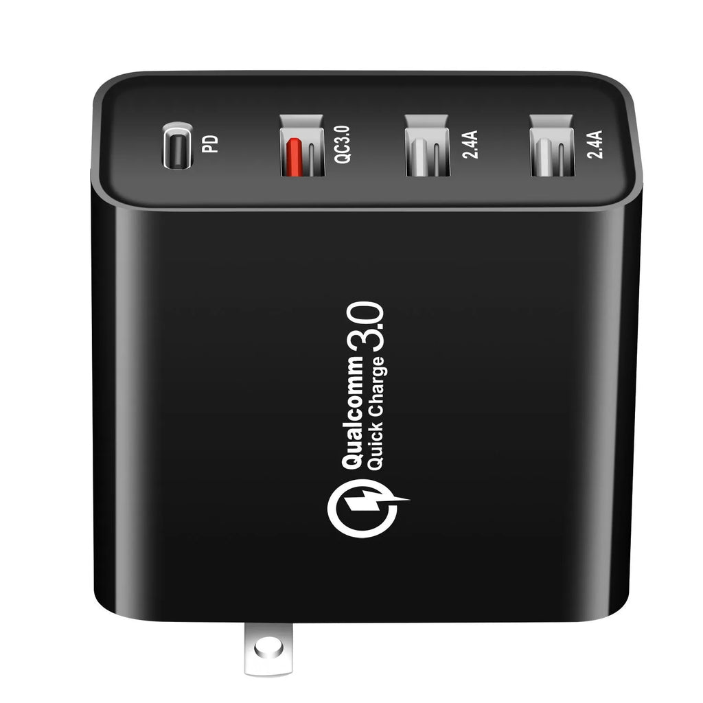 Black four-port USB-C wall charger with UK, EU, US, and AU plug adapters
