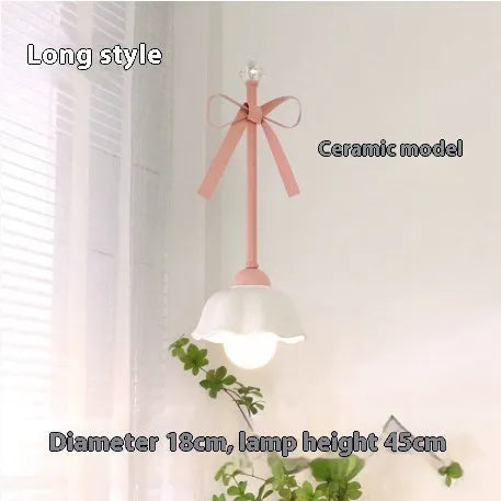 Bow-shaped small pendant lamp in cream style with crown finish, suitable for dining room or bedroom ceiling installation