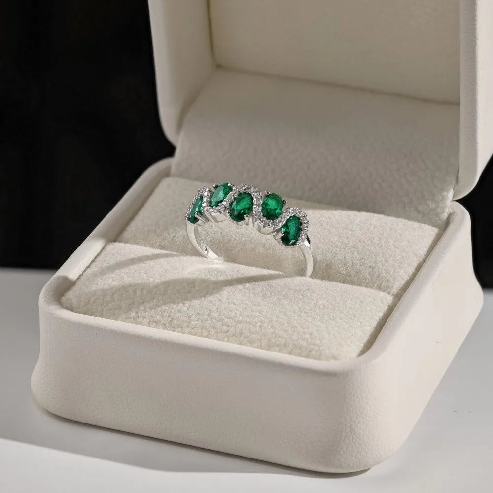 S925 sterling silver oval twisted ring with zircon inlay on white background, women geometric silver ring