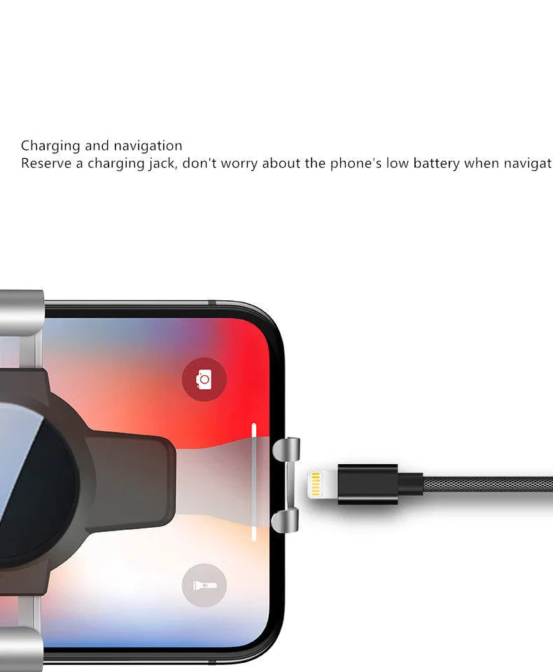 Black S4 gravity mirror car phone bracket mounted on a car air vent, holding a smartphone.