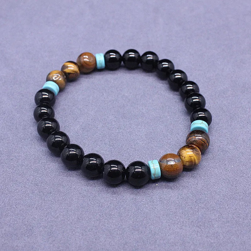 Geometric agate jewellery set with black bracelet and tiger-eye necklace