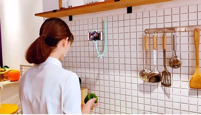Black flexible rubber phone holder with suction cup extended on a 62cm arm