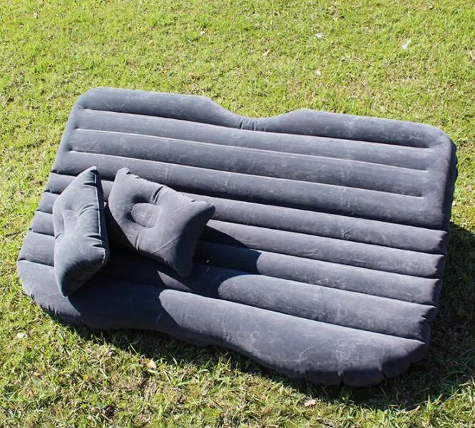 Car inflatable bed with ultra-thickened 0.5mm flocking cloth in Black Wave colour, shown inflated in rear of five-seater car