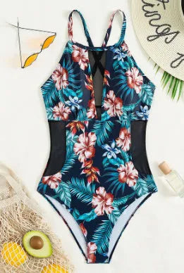 Women's deep V-neck one-piece swimsuit in a printed gradient pattern, showing European/American fit.
