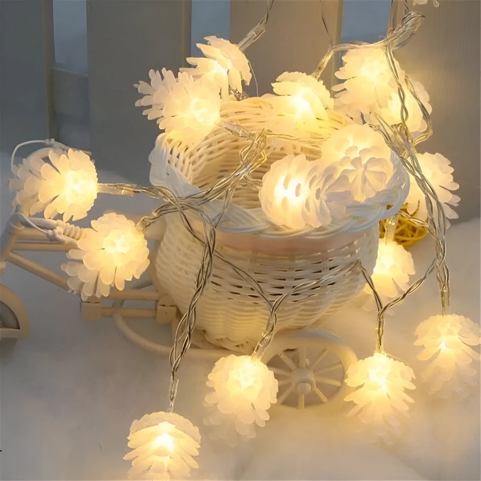 Warm white battery-powered LED pine cone light string for indoor and outdoor decoration