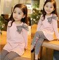 Pink cotton girls clothing set shown in sizes for children 110cm to 140cm tall.