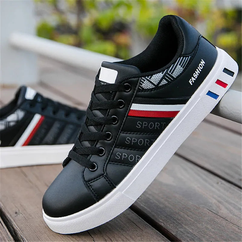 A pair of men's sports shoes shown in black, also available in grey and white, with size tags indicating 39 to 44.