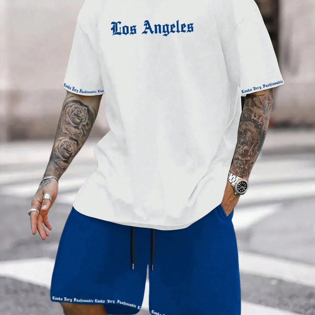 Men's navy blue printed short-sleeved top and matching shorts sports set on a white background