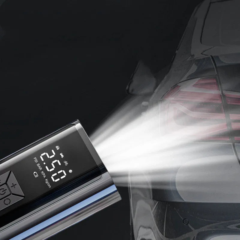 Portable car wireless digital display electric tyre pump with LED light and pressure gauge on a dark background