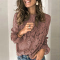 Women's black hollow lace shirt with loose fit, long sleeves, and zipper detail.