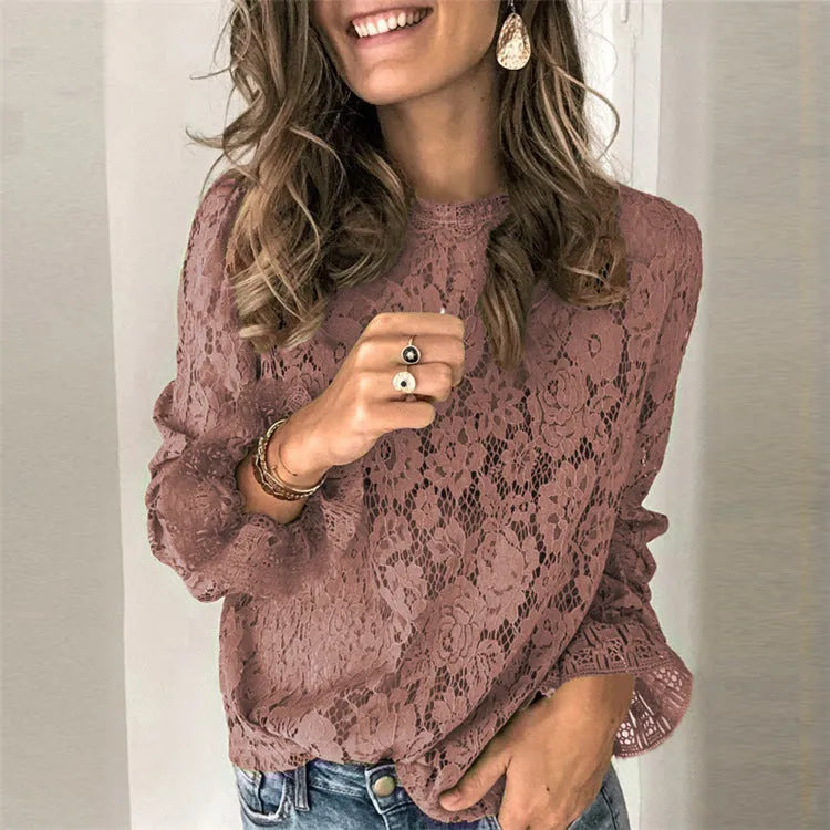 Women's black hollow lace shirt with loose fit, long sleeves, and zipper detail.