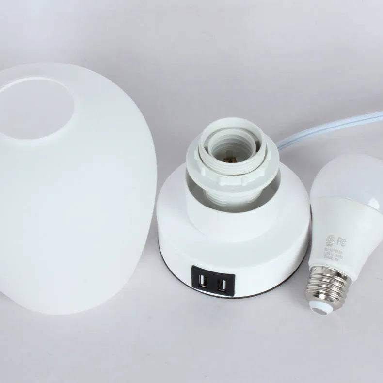 Nordic glass touch dimming bedside night light with three colour settings and USB port, white glass on dark surface