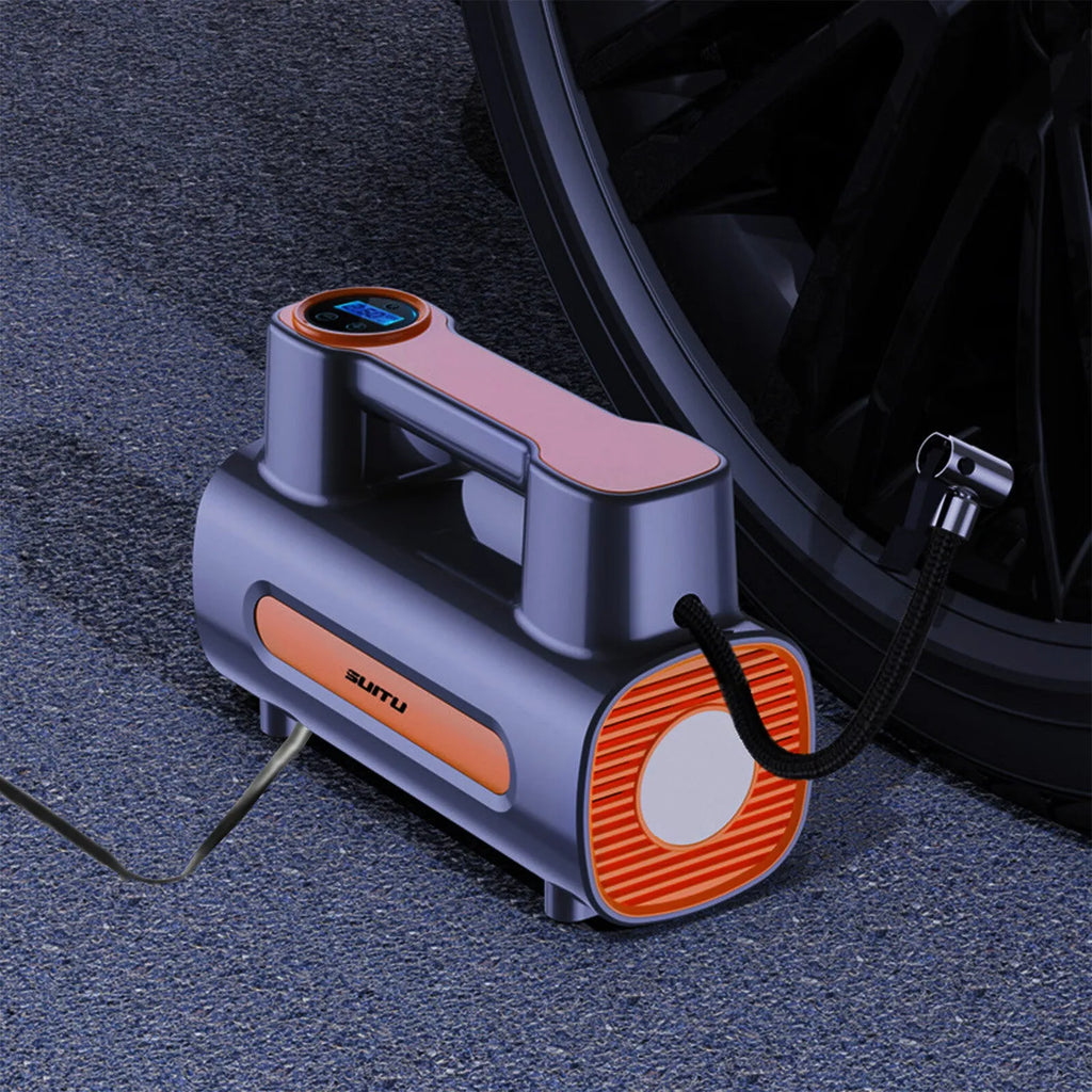 Cordless tyre inflator with digital display, ABS body, and USB charging port on a flat surface