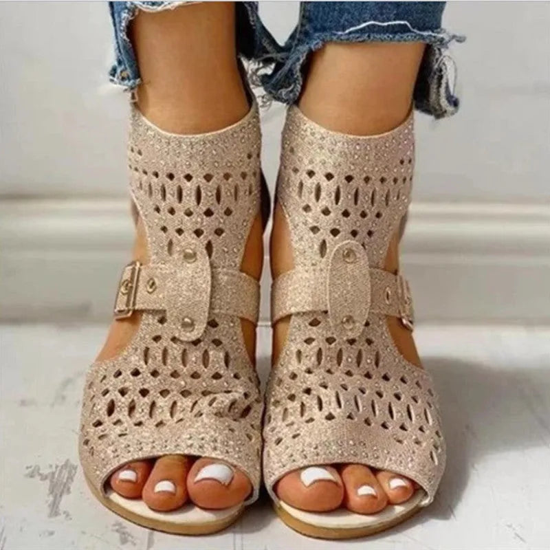 Women's rivet flat sandals with back zipper and low wedge heel in patent leather finish