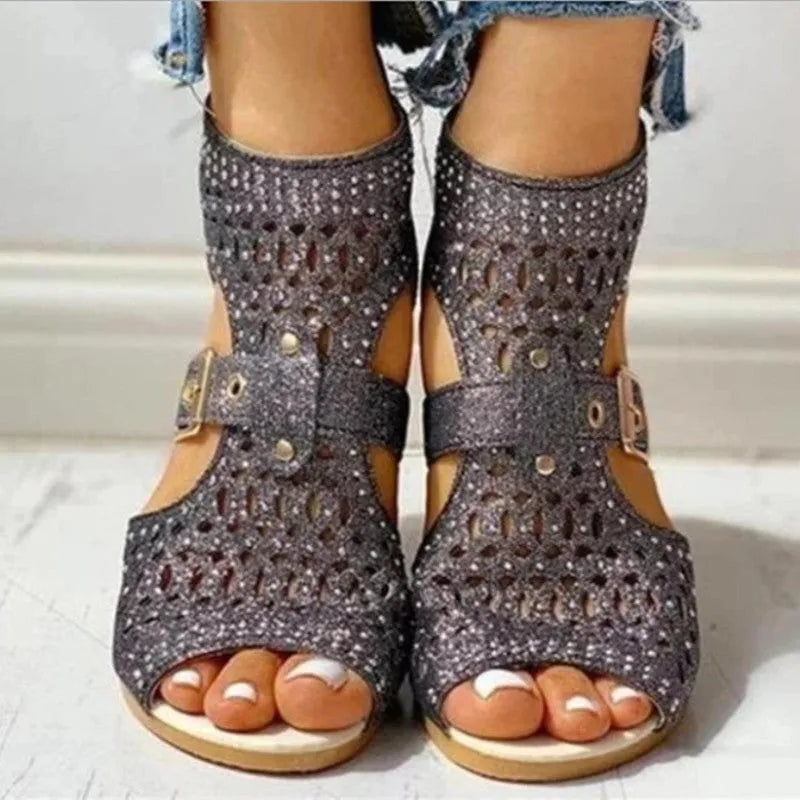 Women's rivet flat sandals with back zipper and low wedge heel in patent leather finish