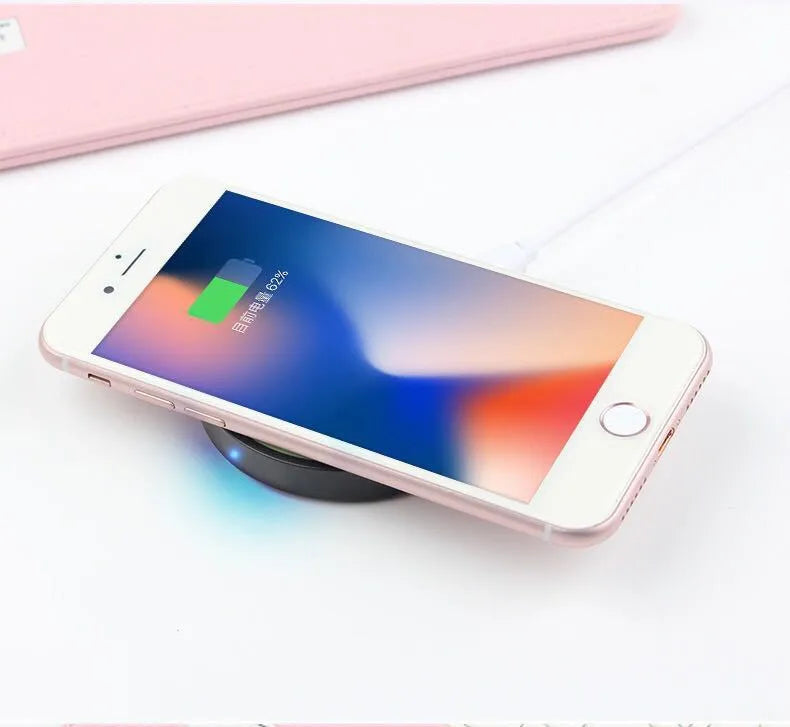 Square Qi wireless charger base in multiple colours showing 69mm dimensions