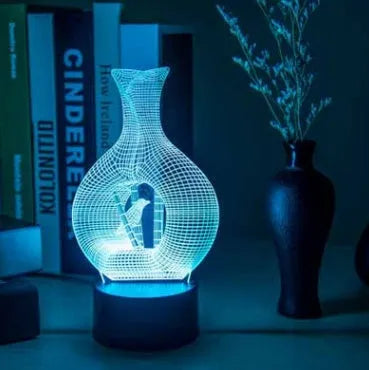 3D acrylic LED night light with touch button on ABS base, showing multi-colour illumination.