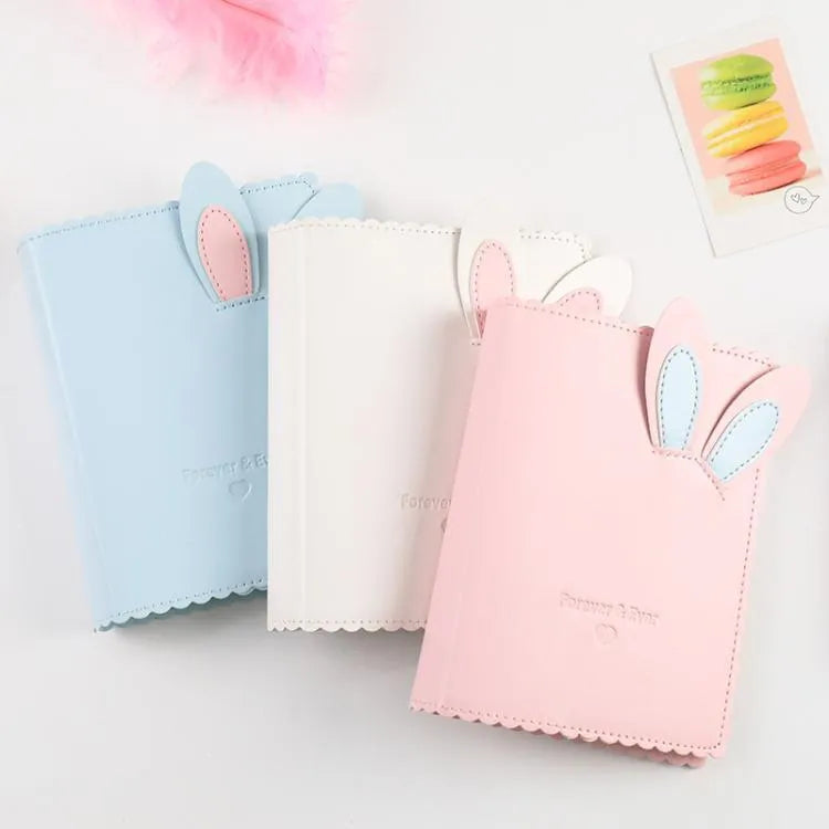 Rabbit style mini photo album with PU cover in pink, blue or white measuring 11.5 x 15.5 cm