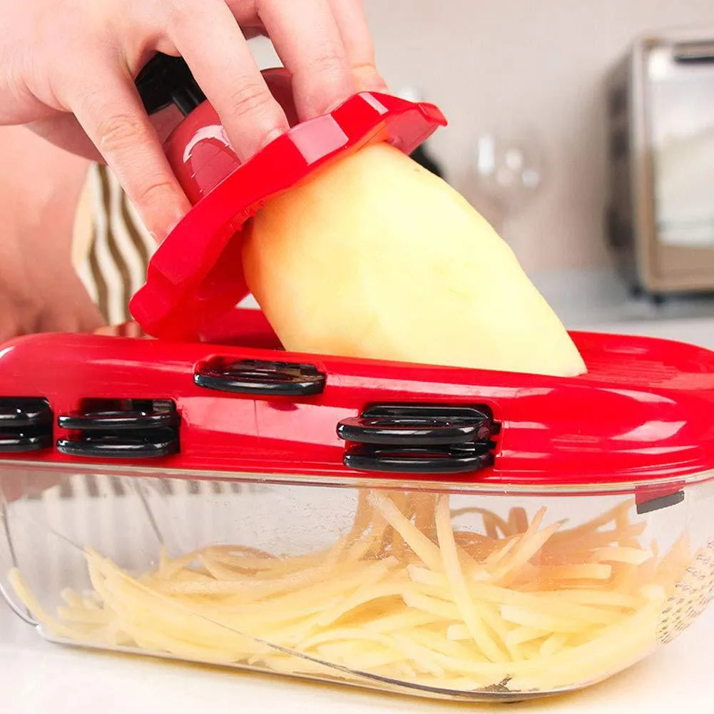 Stainless steel multifunctional vegetable cutter in red with 7 blades, hand guard, and clear PET container
