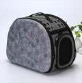 Collapsible EVA pet carrier bag in medium size, pink colour, folded flat with two zippers