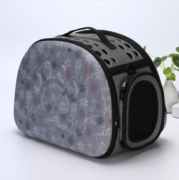 Collapsible EVA pet carrier bag in medium size, pink colour, folded flat with two zippers