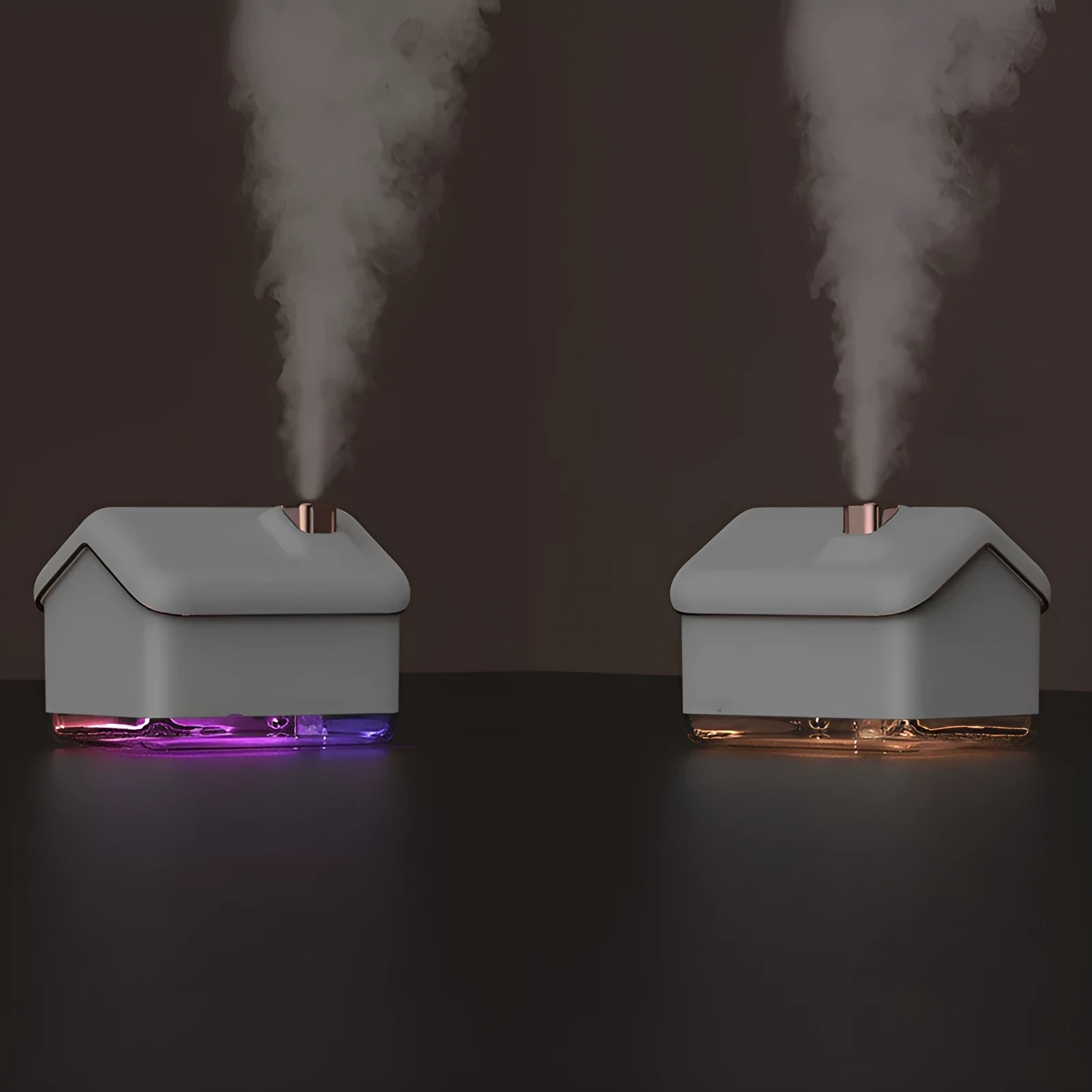 White Igloo-shaped ultrasonic humidifier and essential oil diffuser with LED light on a wooden table.