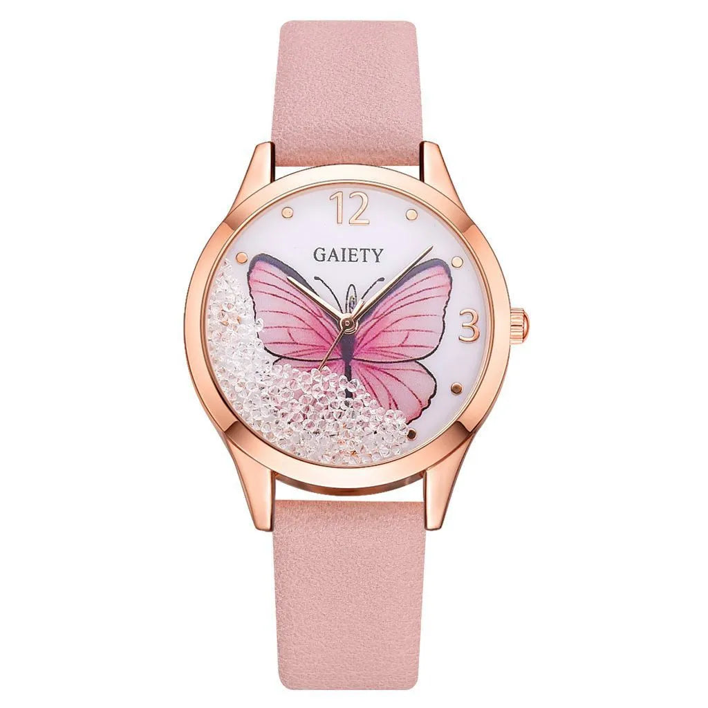 Gaiety brand ladies wristwatch with rhinestone butterfly decoration on a round dial with leather strap.