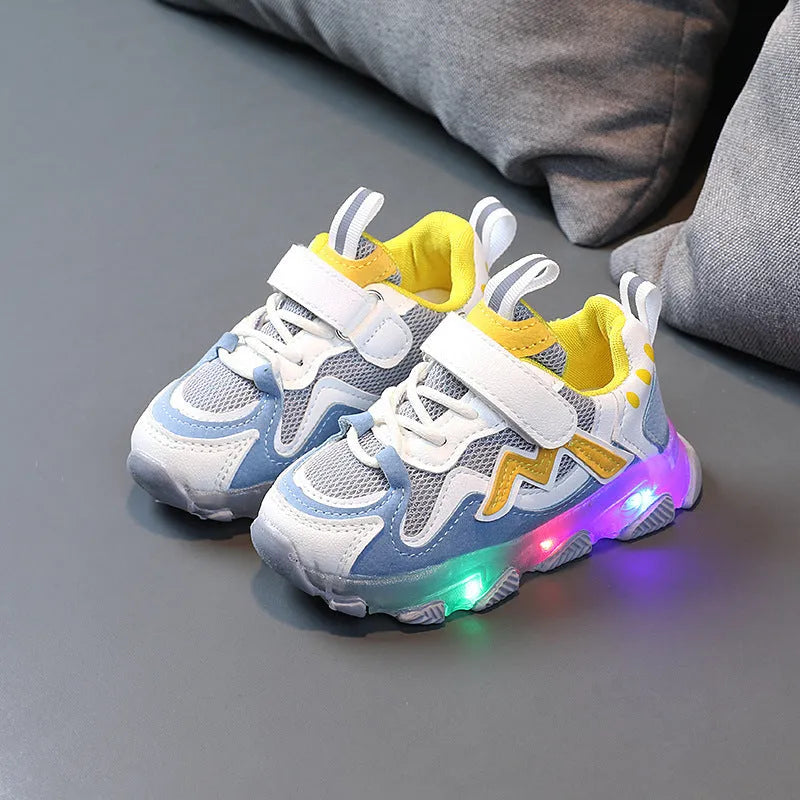 Children's bright light mesh Velcro sneakers in black, grey, or pink with a rubber sole.