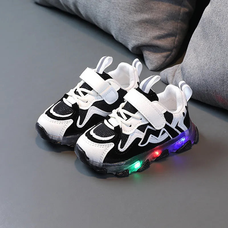 Children's bright light mesh Velcro sneakers in black, grey, or pink with a rubber sole.