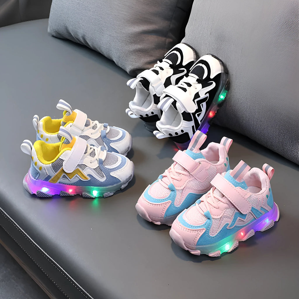 Children's bright light mesh Velcro sneakers in black, grey, or pink with a rubber sole.
