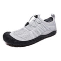 Low-top mesh water shoes with elastic band and rubber sole for river tracing and swimming.