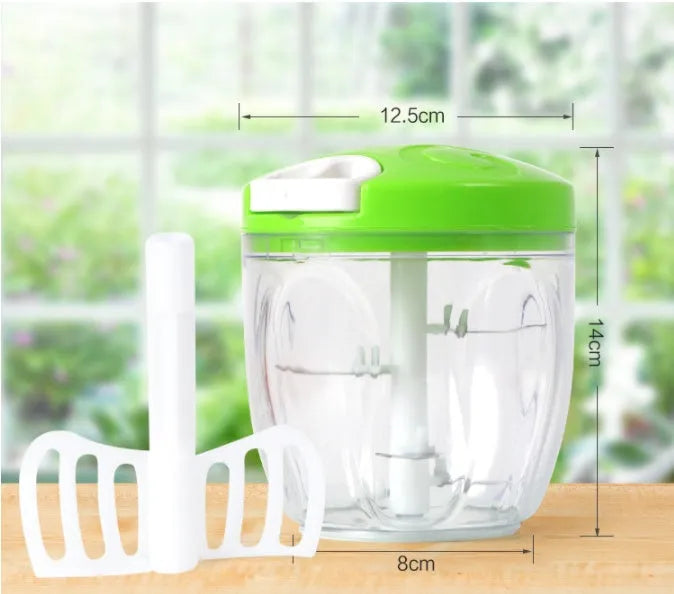 Green manual kitchen chopper with three stainless steel blades and a 500ml clear container.