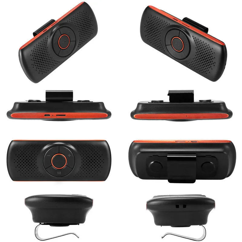 Orange plastic Bluetooth hands-free car kit mounted on a sun visor.