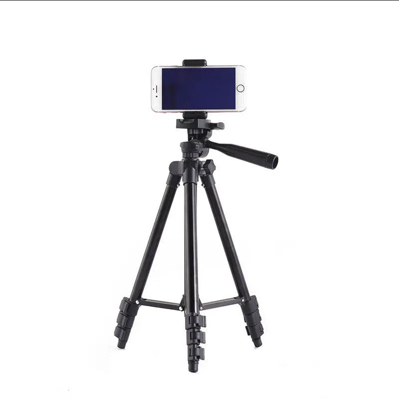 Black aluminium camera tripod with 3D head extended to maximum height
