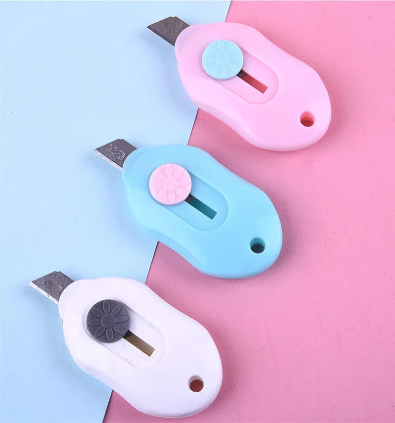 Cartoon art knife with open box design in Miffy style for manual production