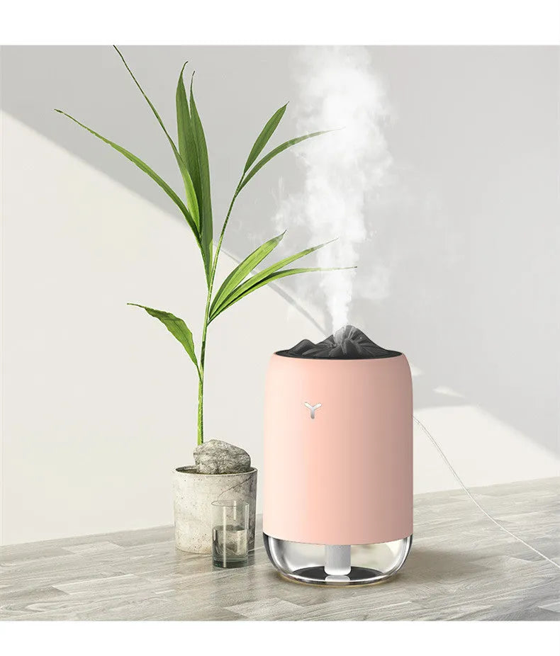Magic Flame columnar humidifier in light blue colour with USB cable for desktop placement