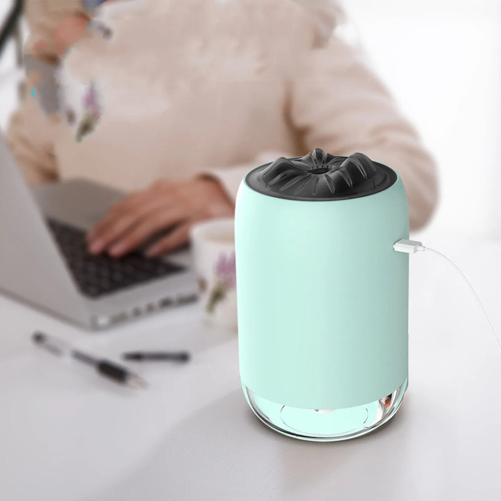 Magic Flame columnar humidifier in light blue colour with USB cable for desktop placement