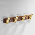 Black walnut aluminium clothes hooks with brass wire drawing finish on a bathroom wall