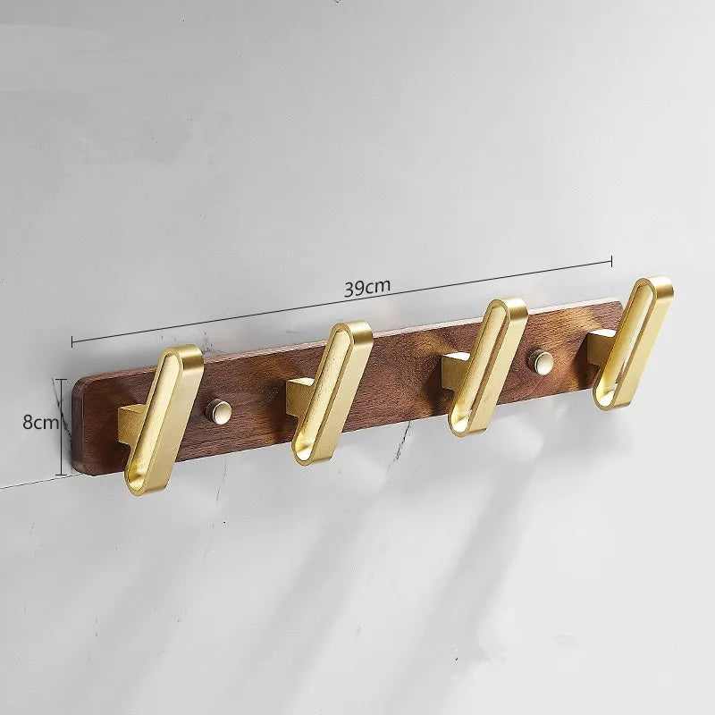 Black walnut aluminium clothes hooks with brass wire drawing finish on a bathroom wall