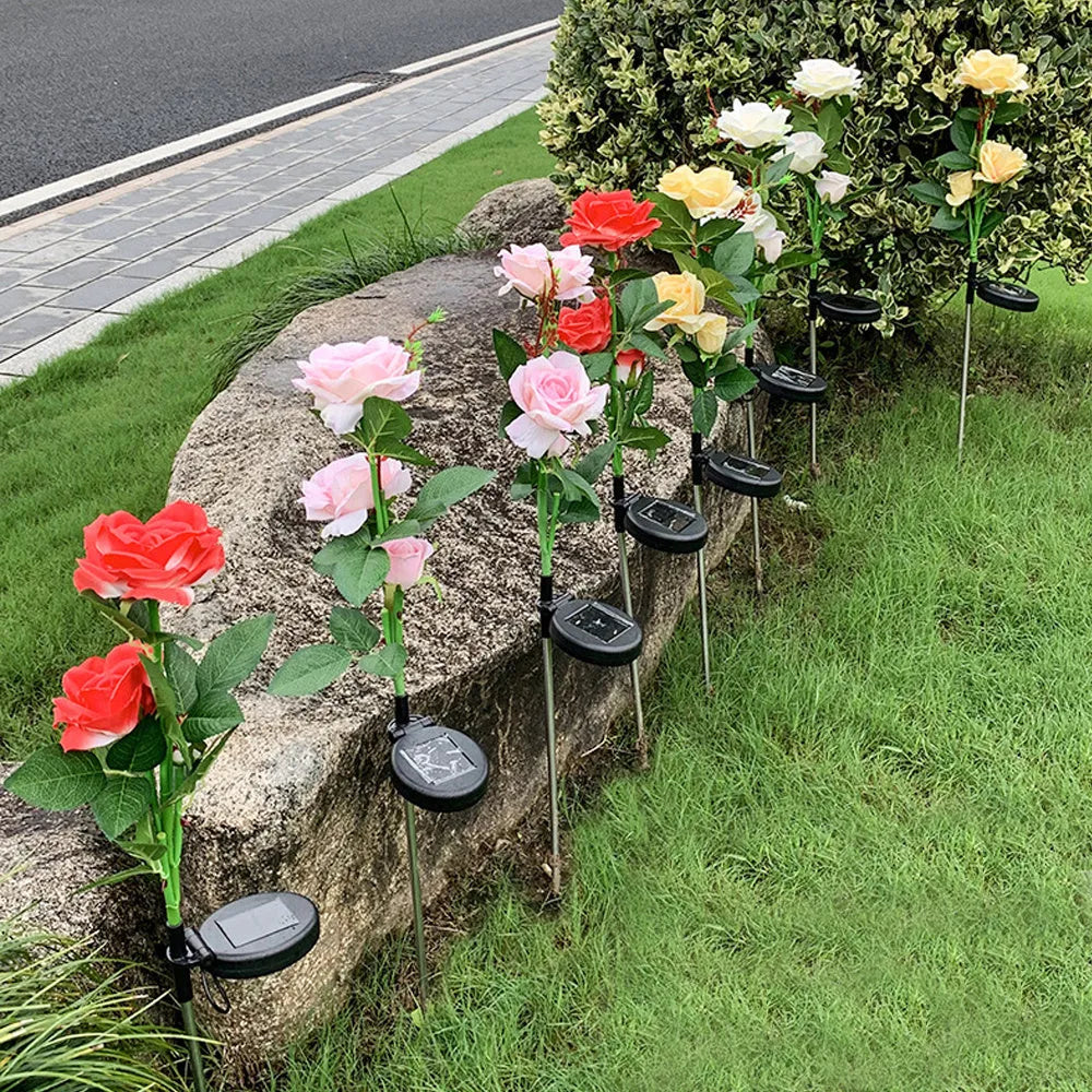 Solar rose 3-head garden ground plug lamp with 80cm stainless steel stem and silk cloth petals on lawn