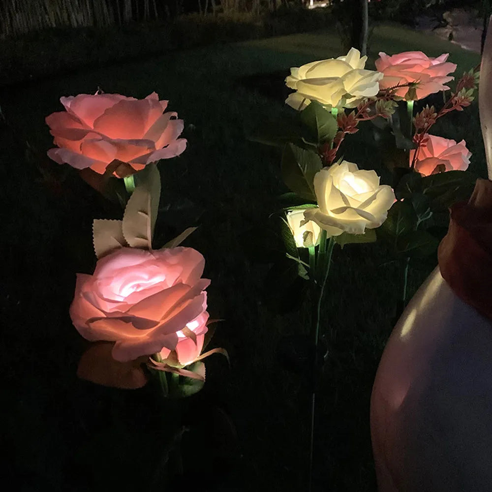 Solar rose 3-head garden ground plug lamp with 80cm stainless steel stem and silk cloth petals on lawn