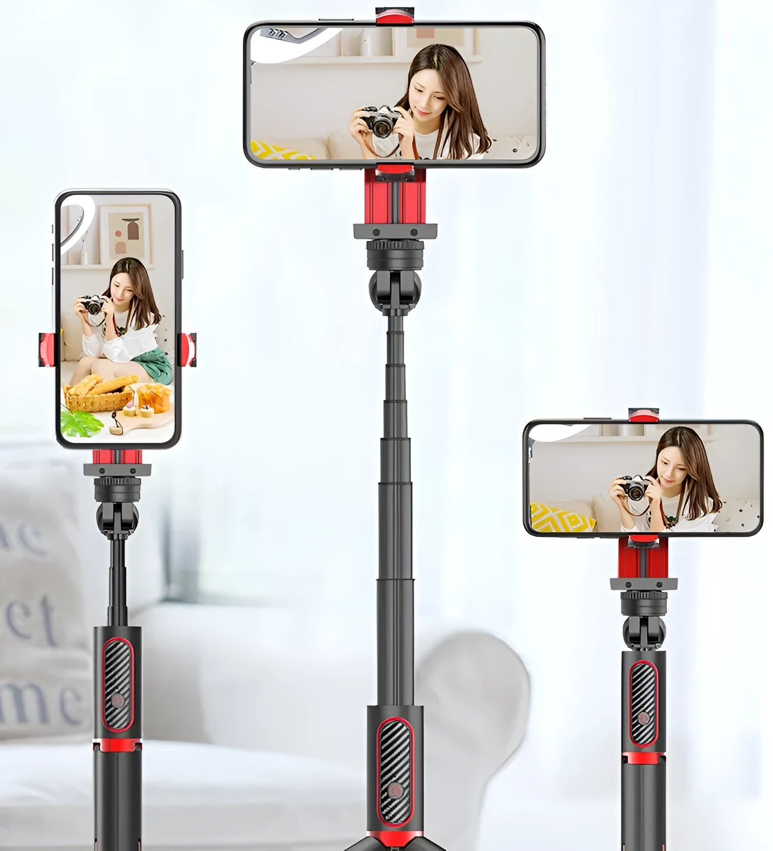 Black aluminium video stabiliser tripod extended with a mobile phone secured in the clamp.